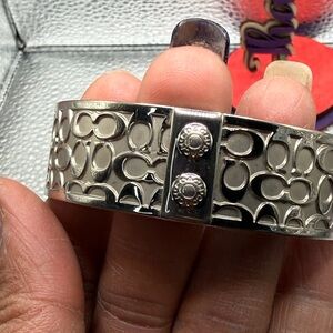Coach Silver-Tone Signature “C” Bangle Bracelet